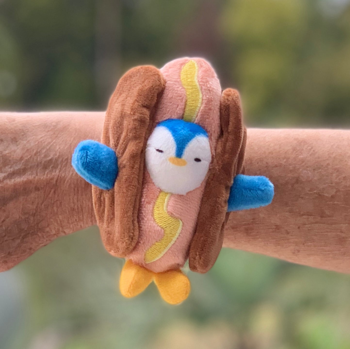 WRIST WIENER - Cute and Cuddly Penguin in a Hot Dog Costume Slap Bracelet